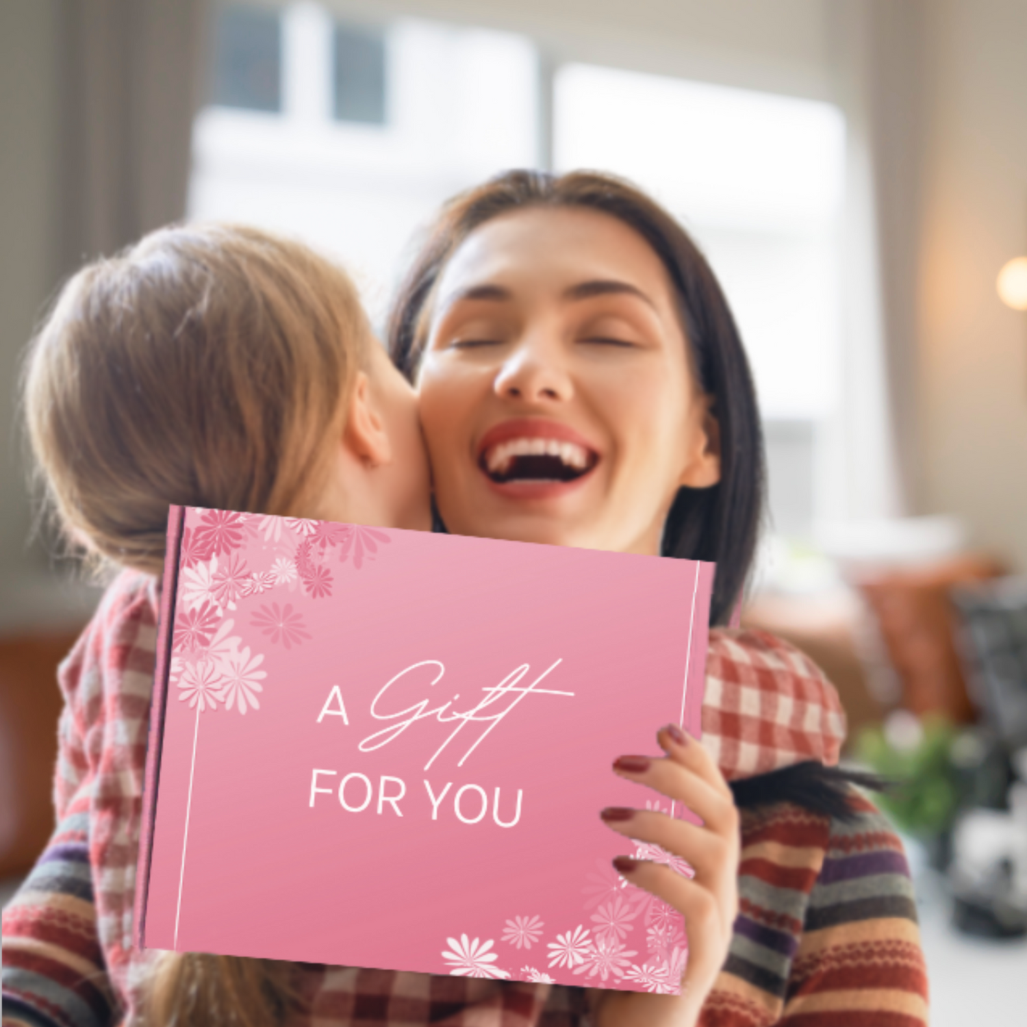 Woman hugging a child with a pink gift box with 'A Gift For You' text. Receiving a get well gift box