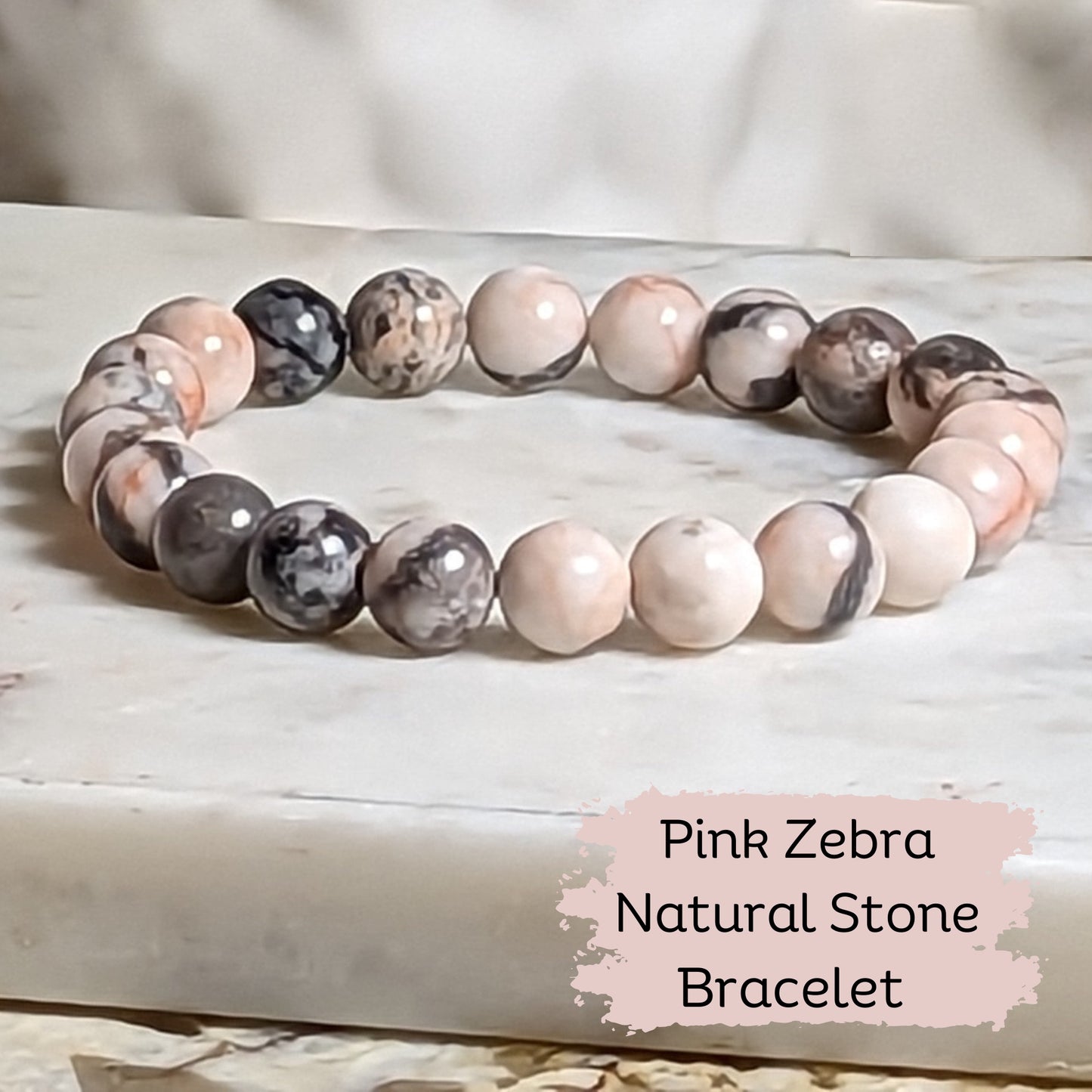 Natural pink zebra stone bracelet included in women's self-care gift package and thoughtful gift for her