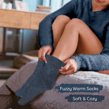 Soft blue fuzzy socks included in women's get well gift box for comfort and self-care
