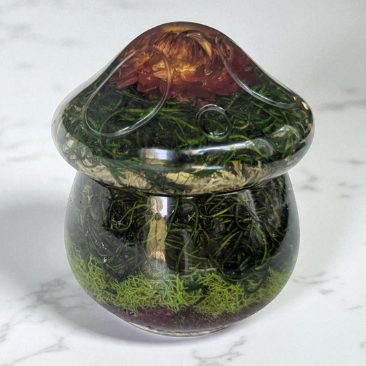 handmade resin mushroom trinket jar with real moss and dried flowers